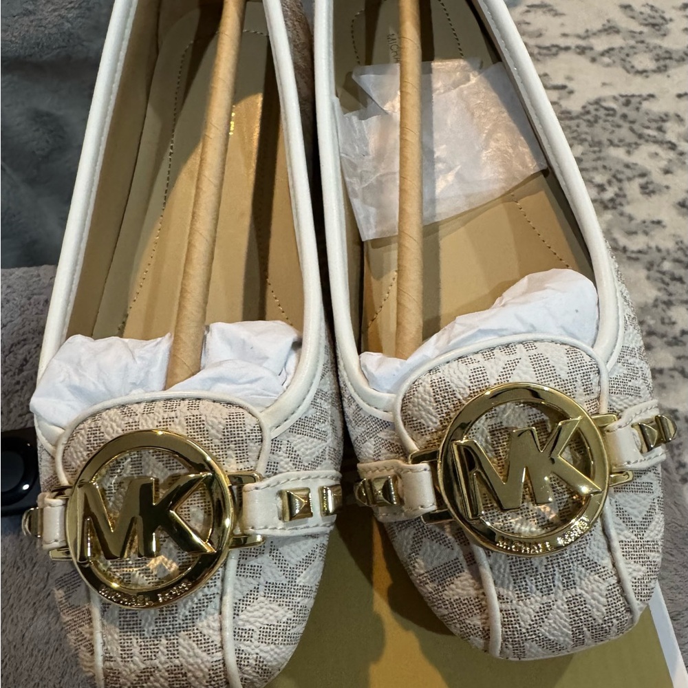 Fulton Studded Moccasin flat shoe signature logo print prominent "MK" logo charm